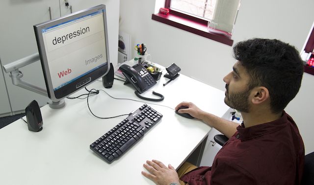 An office worker goes onto an online search engine for advice on depression.