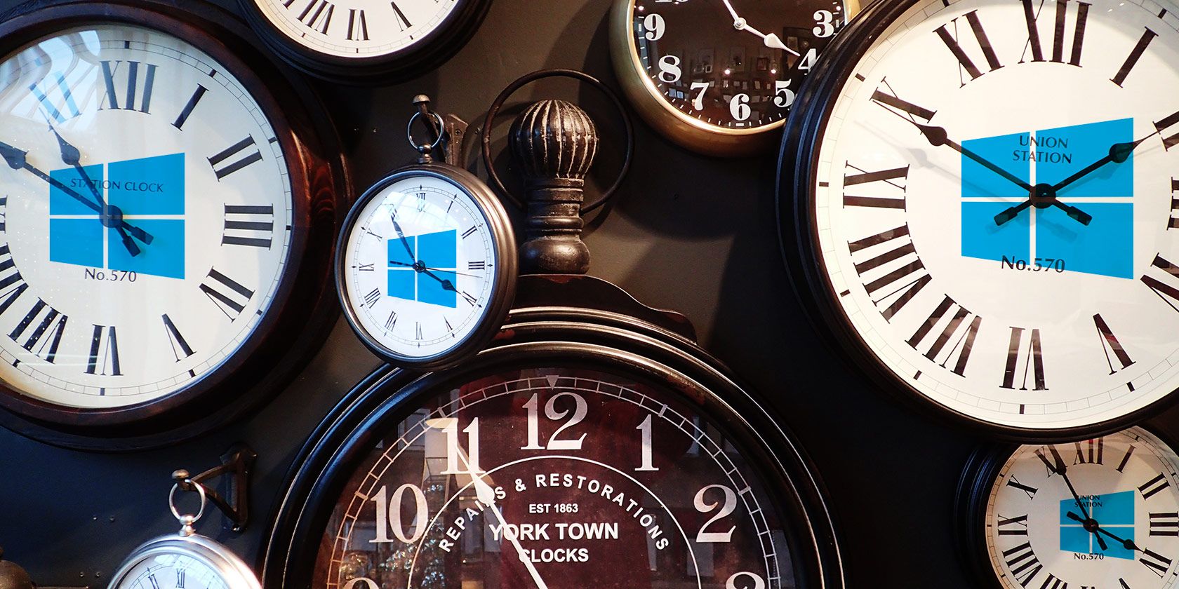 Various clocks showing the Windows logo inside them