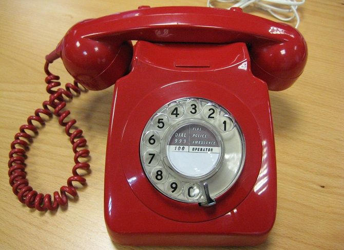 red landline rotary phone