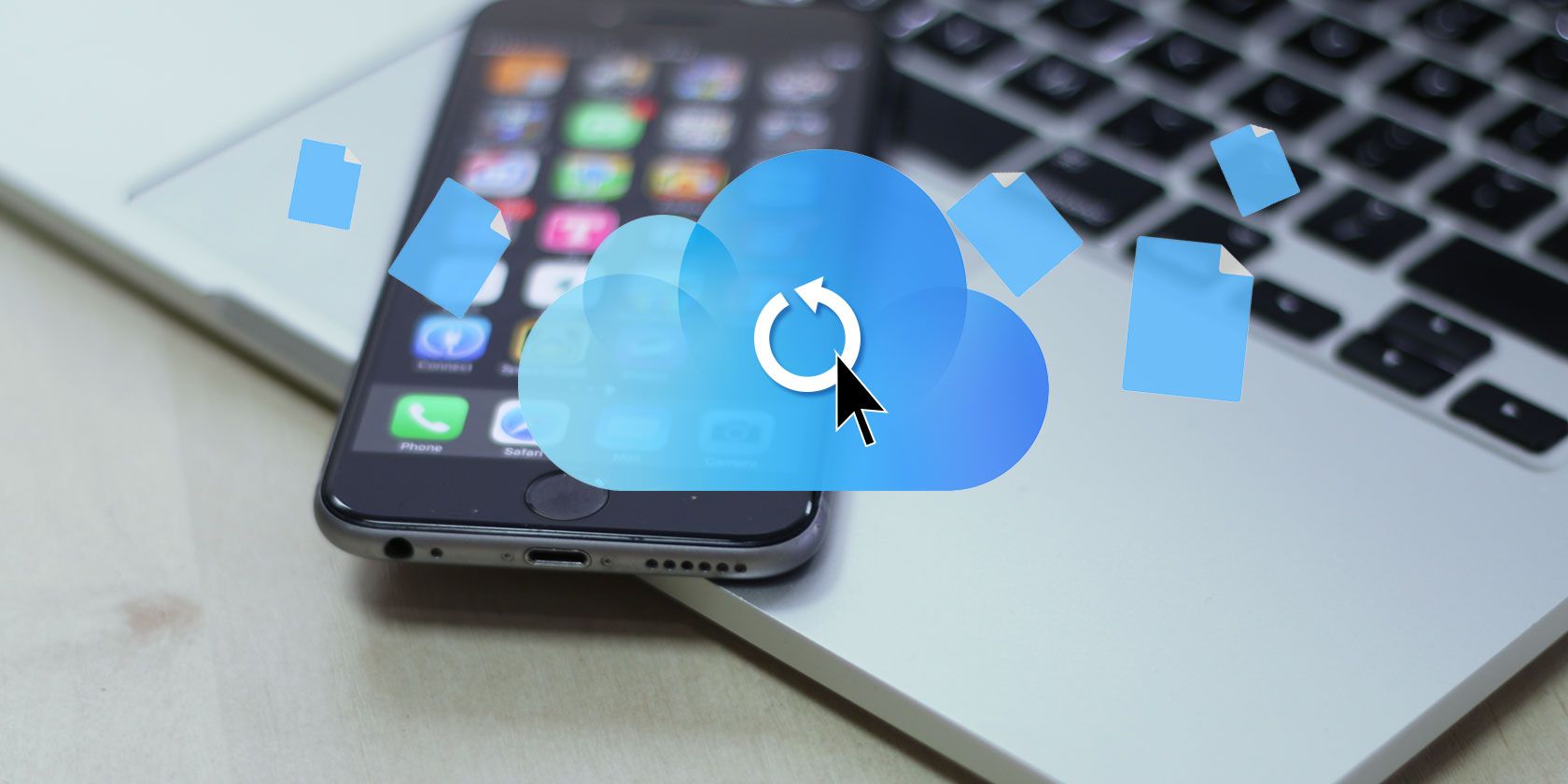 icloud symbol with iphone and macbook in background