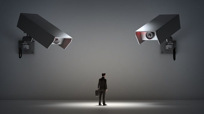 surveillance cameras spying on man