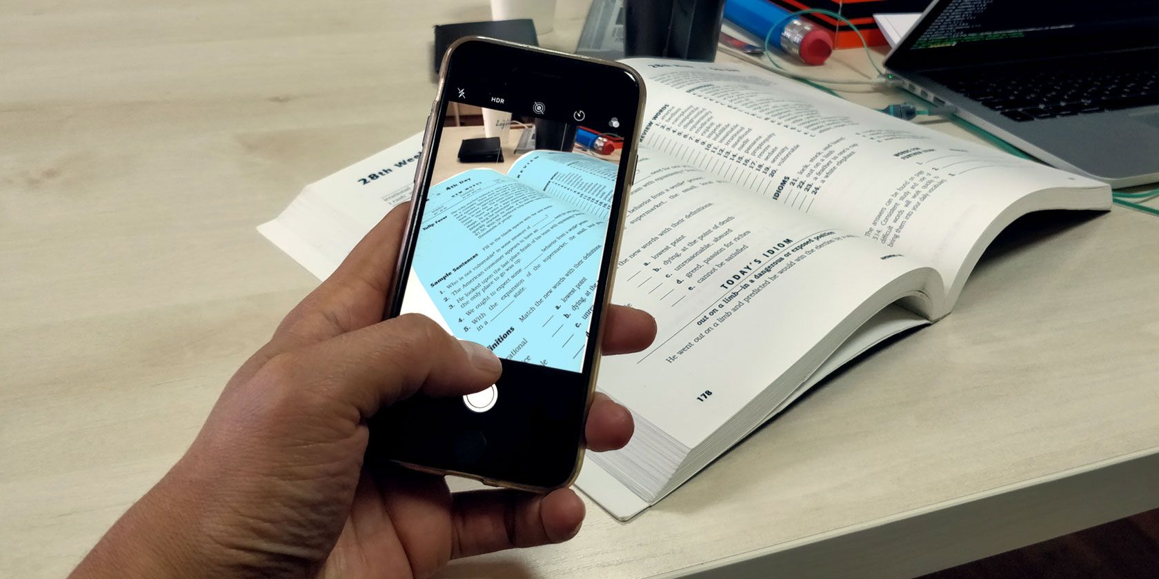 Smartphone scanning documents in an app.