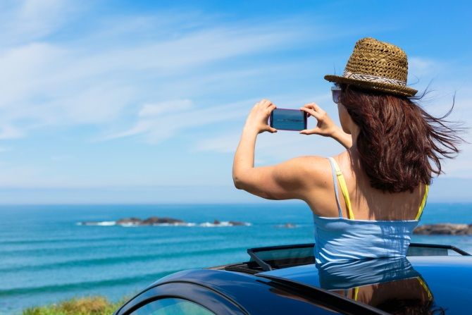 woman smartphone photography car sunroof