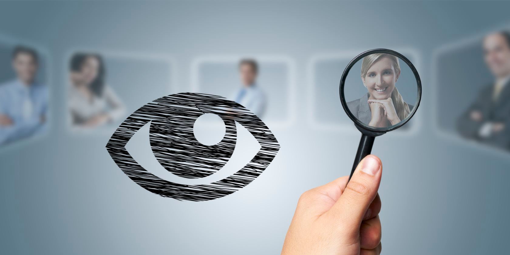 Concept photo of HR looking for the right candidate via a technological magnifying lens.