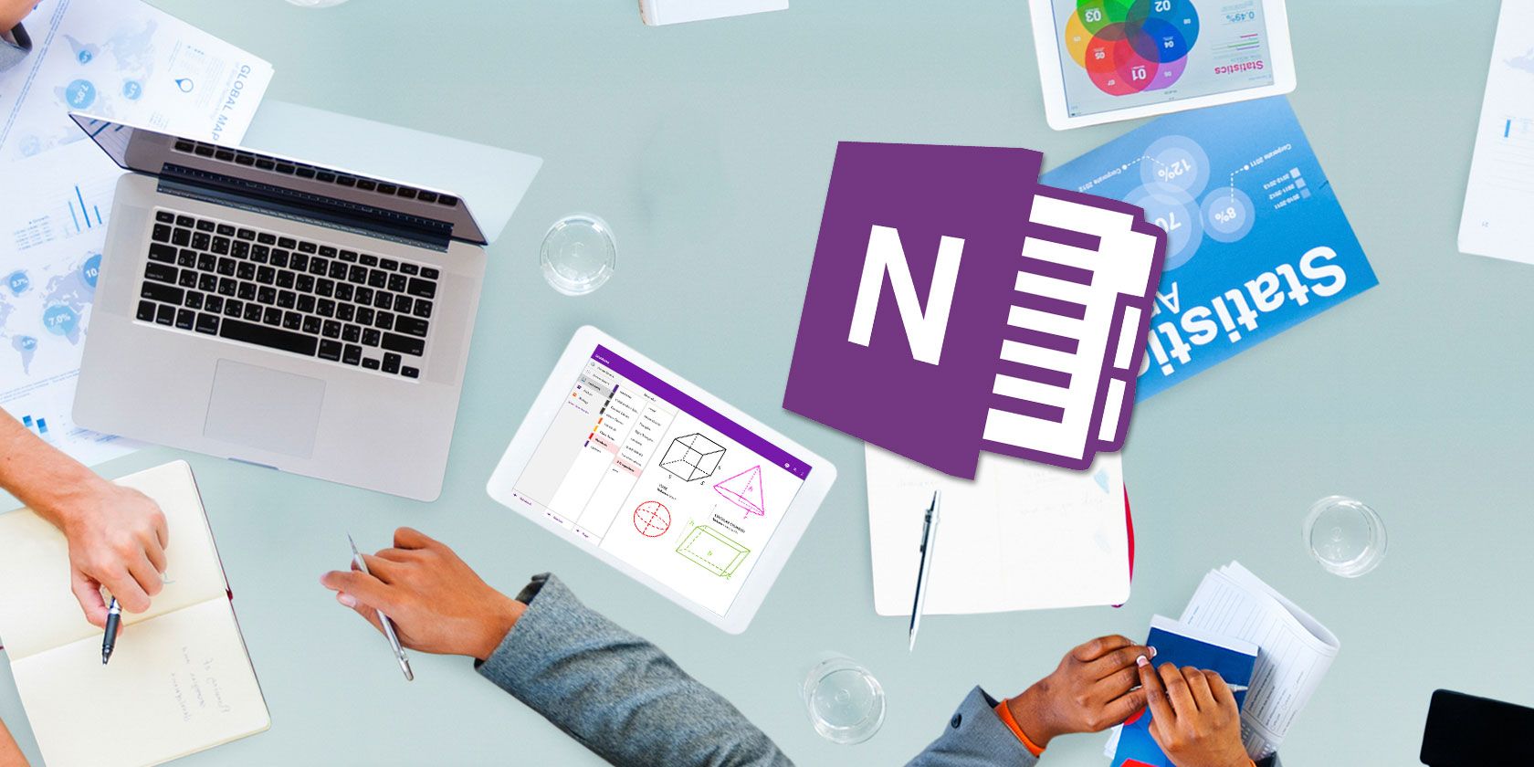 Microsoft OneNote logo on top of a work desk with data stats on background
