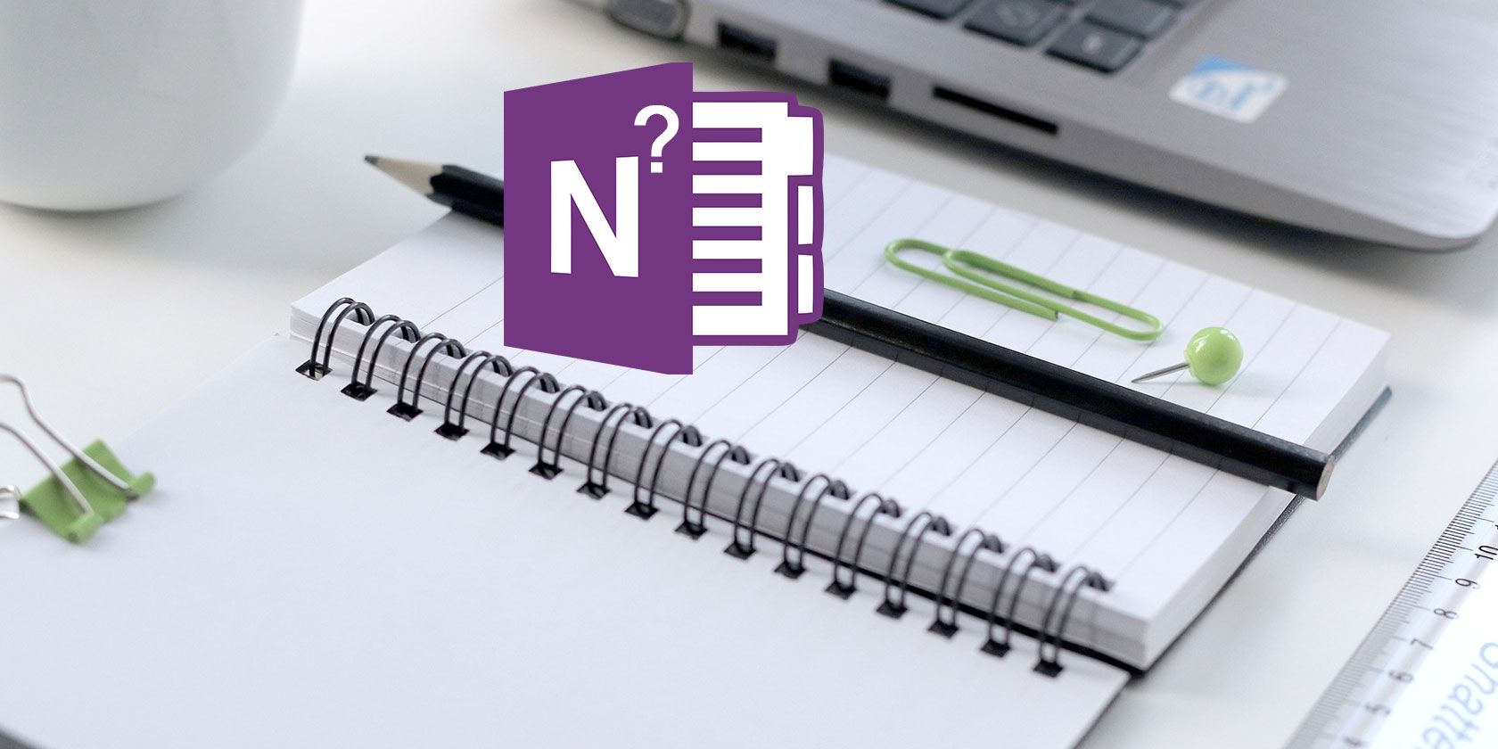 OneNote logo on top of a notebook