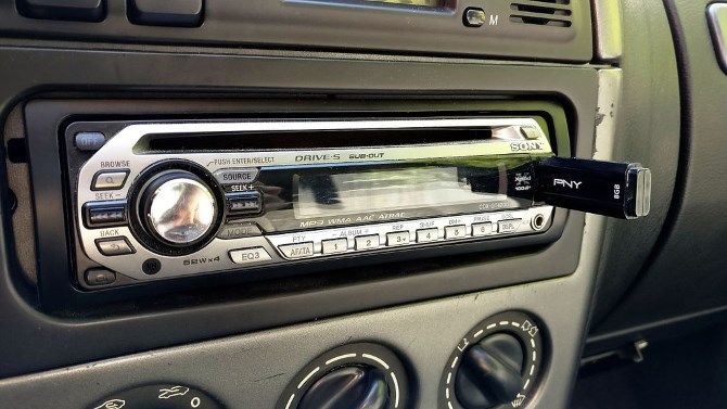 USB flash drive inserted into car stereo