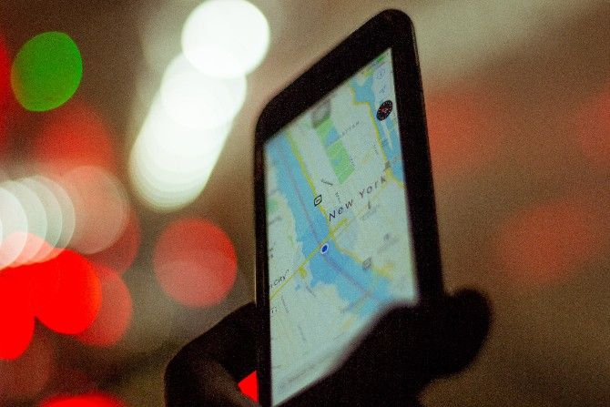 A phone with a GPS navigation app open