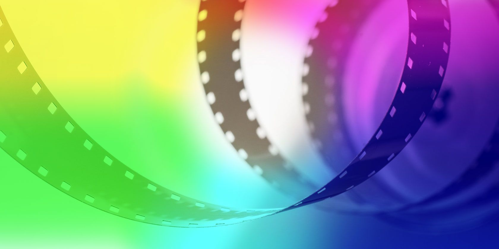 Swirling filmstock over a multicolored background