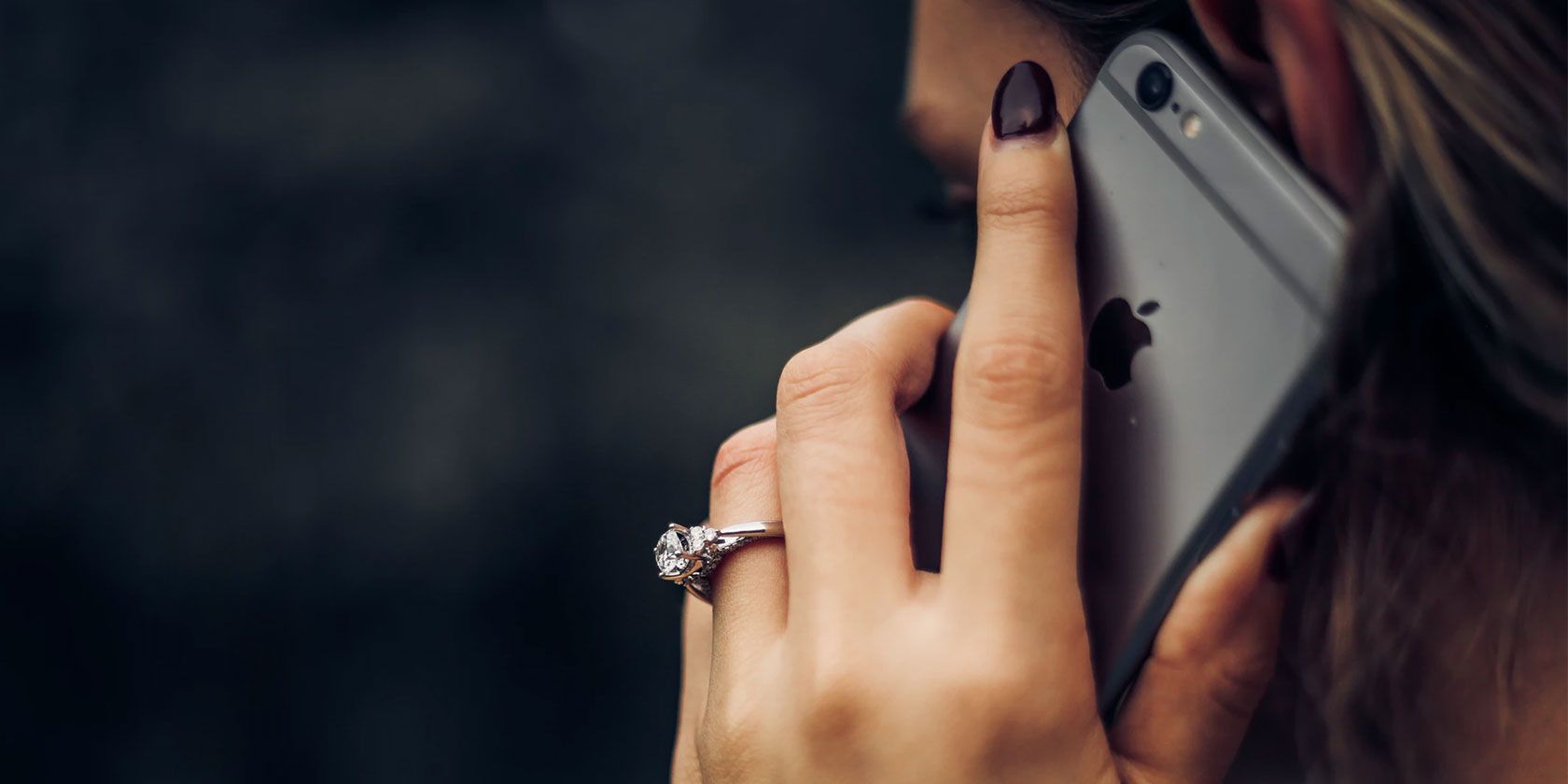 Woman taking a phone call on an iPhone