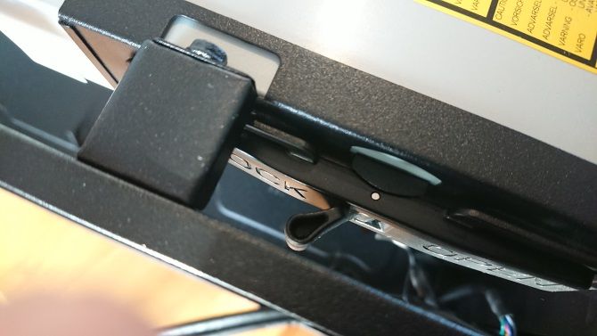 Lock the optical drive into place