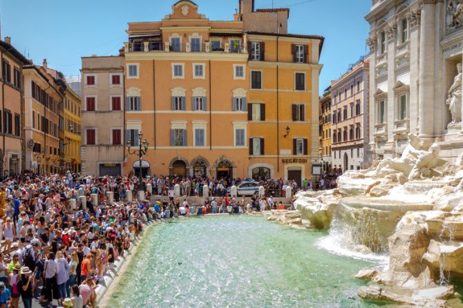 Crowds around Trevi Fountain in Rome