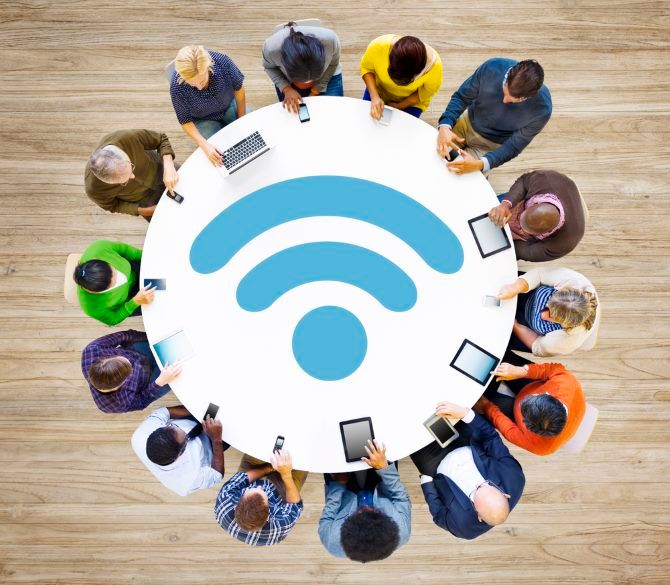 A group of people sharing a Wi-Fi connection