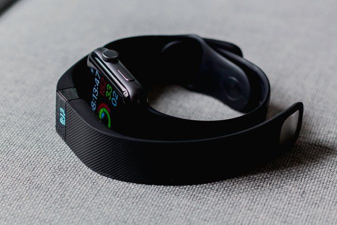 Apple Watch and a FitBit 2