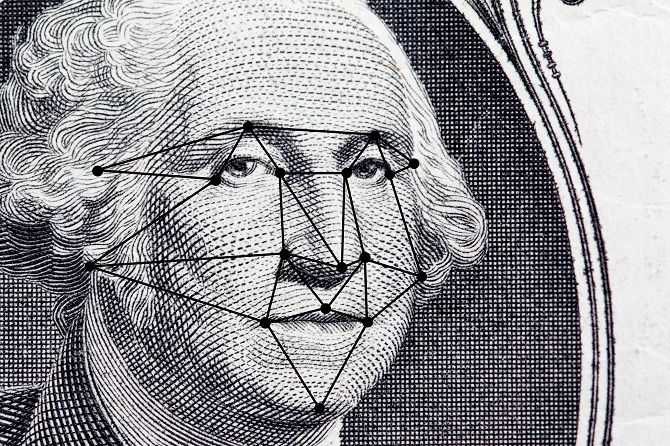 President's face on a dollar bill with facial recognition patterns mapped