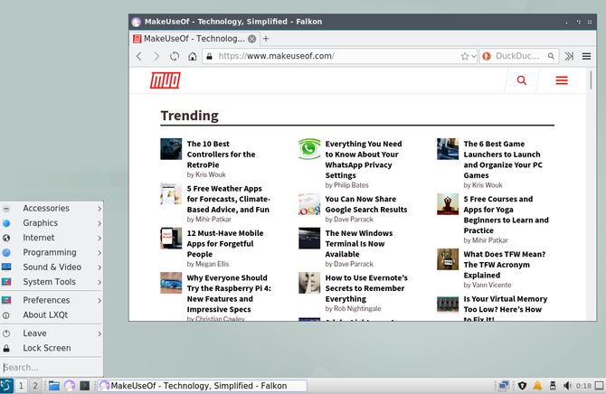 LXQt's app menu and an open web browser
