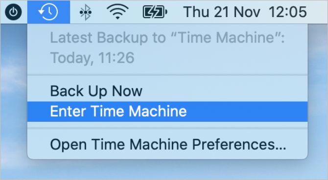 Enter Time Machine option from the menu bar in macOS