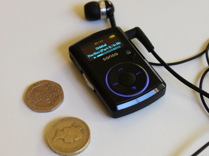 A size comparison between an MP3 player and a coin