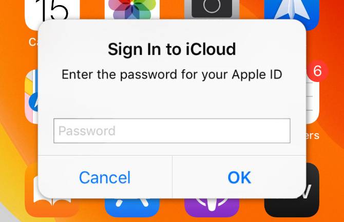 Zaloguj się do alertu iCloud iPhone