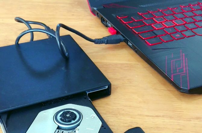 how to install a dvd writer in laptop