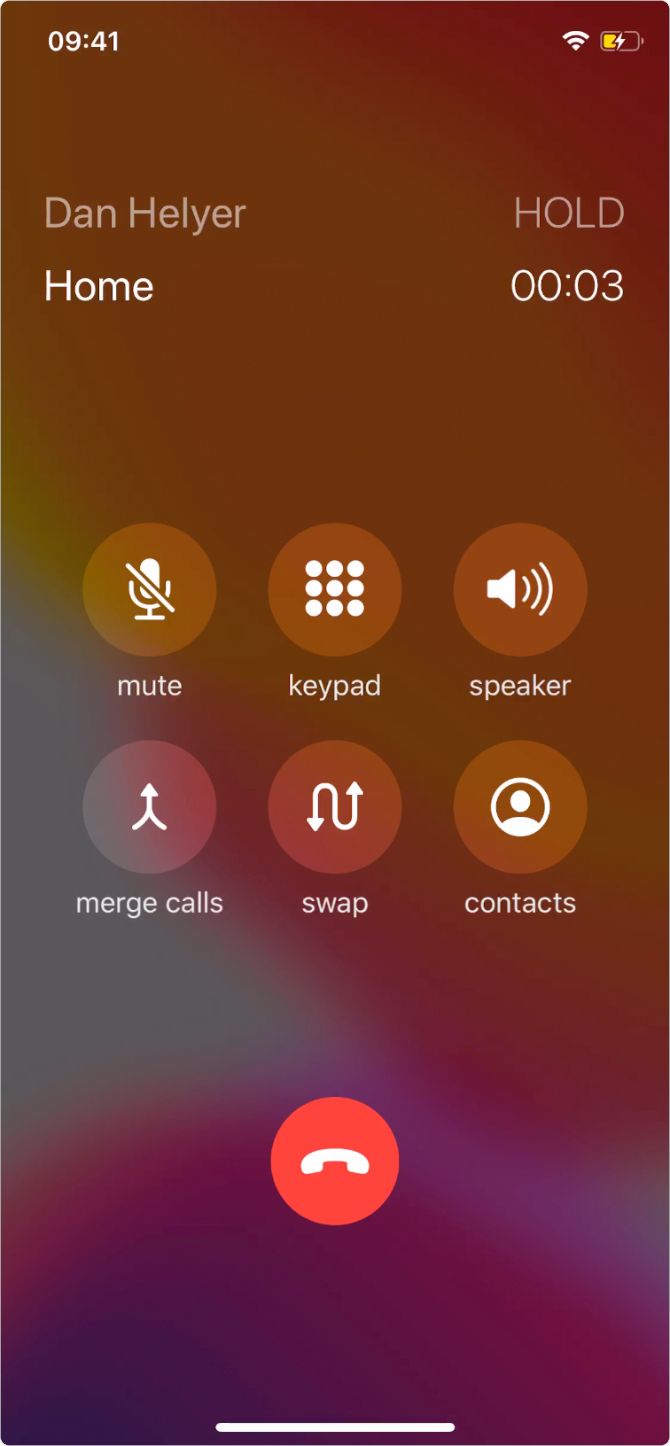 Two active calls on an iPhone, with the first on hold