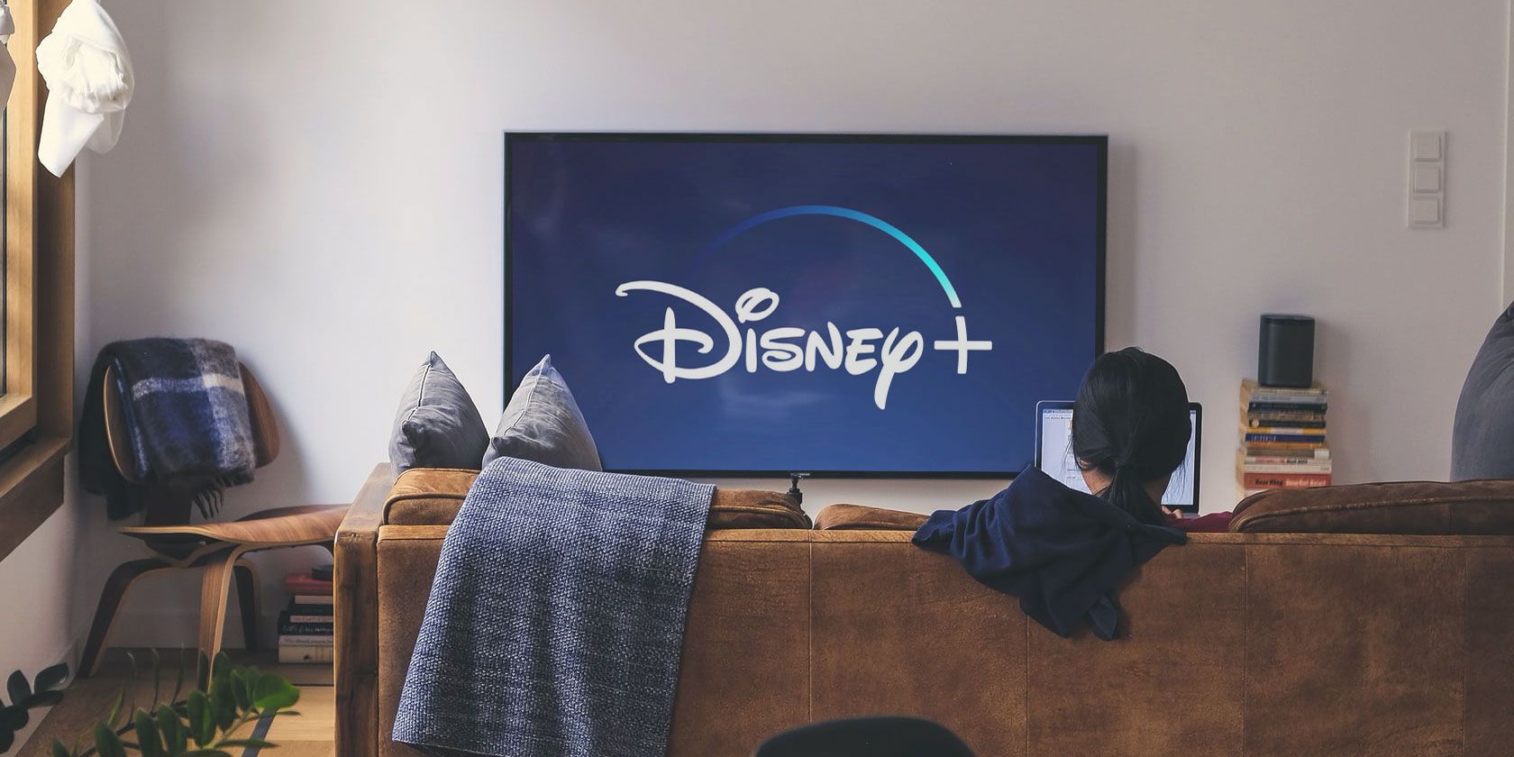 Disney+ logo on a large TV screen