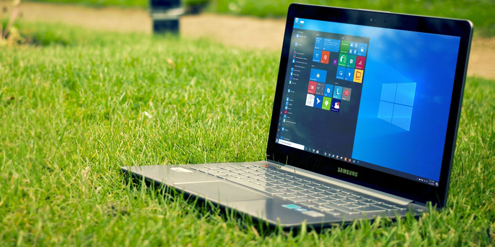 Windows laptop sitting in the grass