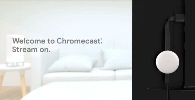 Chromecast plugged into the back of a TV