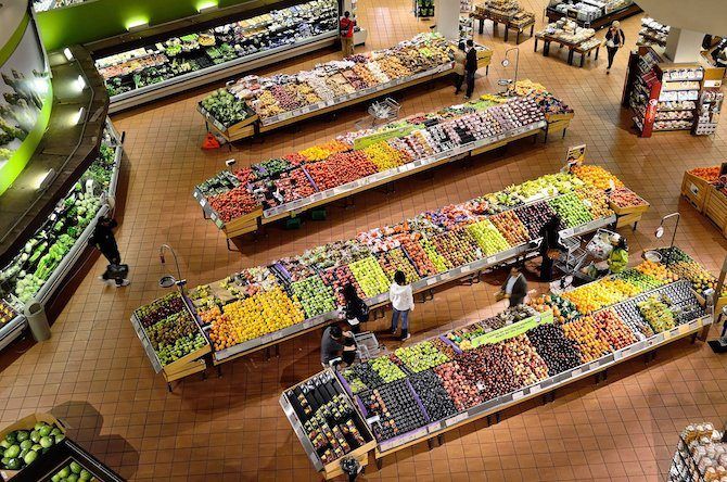 Grocery store fresh fruit and veg stalls