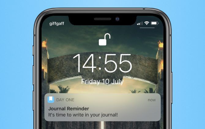 Day One Journal Reminder on iPhone Lock Screen Blue Background