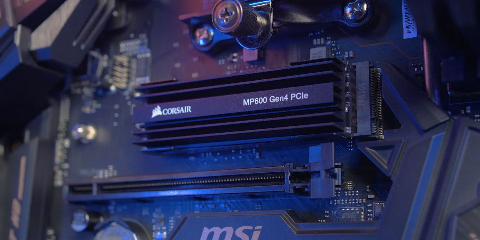 A Corsair NVMe SSD with a heatsink installed in a PC.