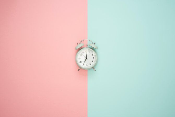 clock on a two-tone background