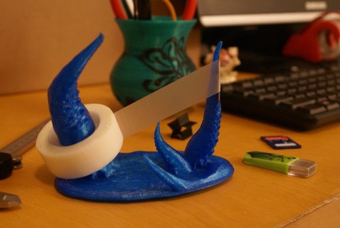 This beautiful tentacle tape dispenser is one of the coolest things you can 3D print at home
