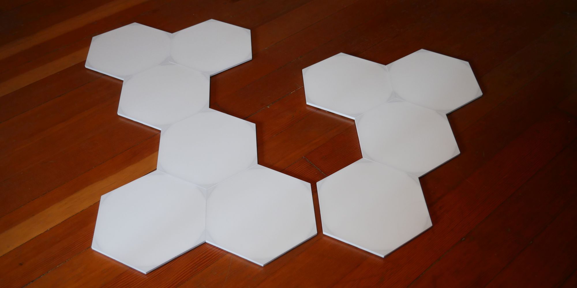 Nanoleaf Shapes Hexagons laid out on floor