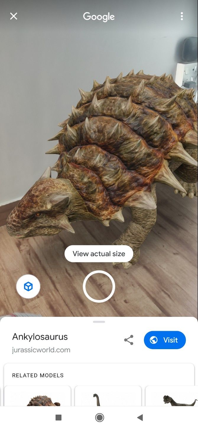 Point your camera anywhere to superimpose an Augmented Reality dinosaur on it