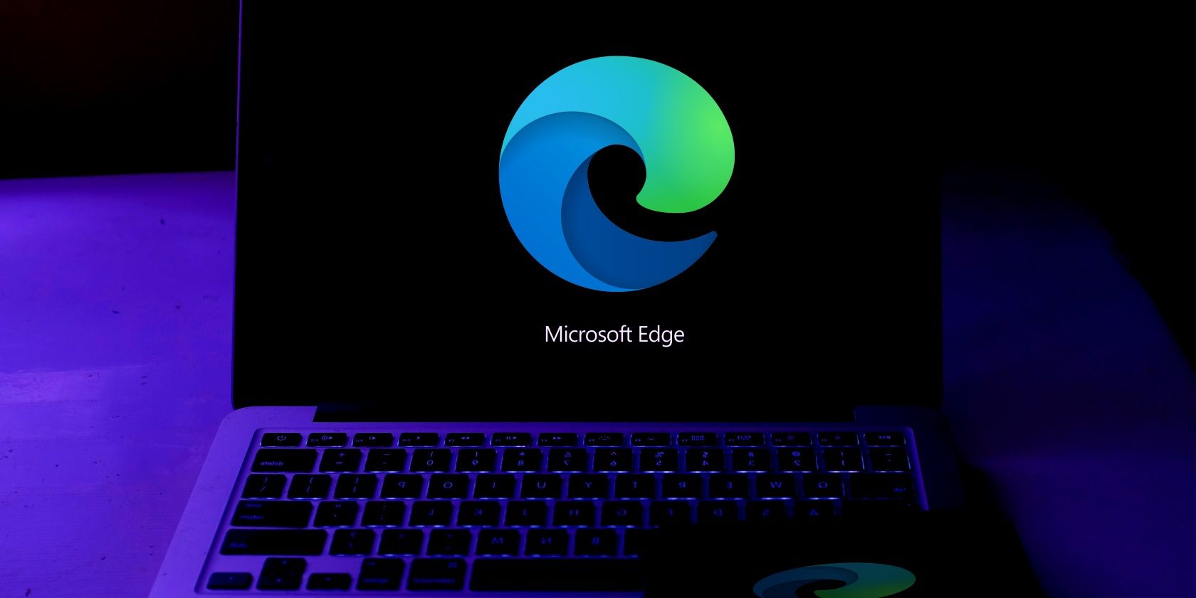 The Edge logo on a laptop and phone