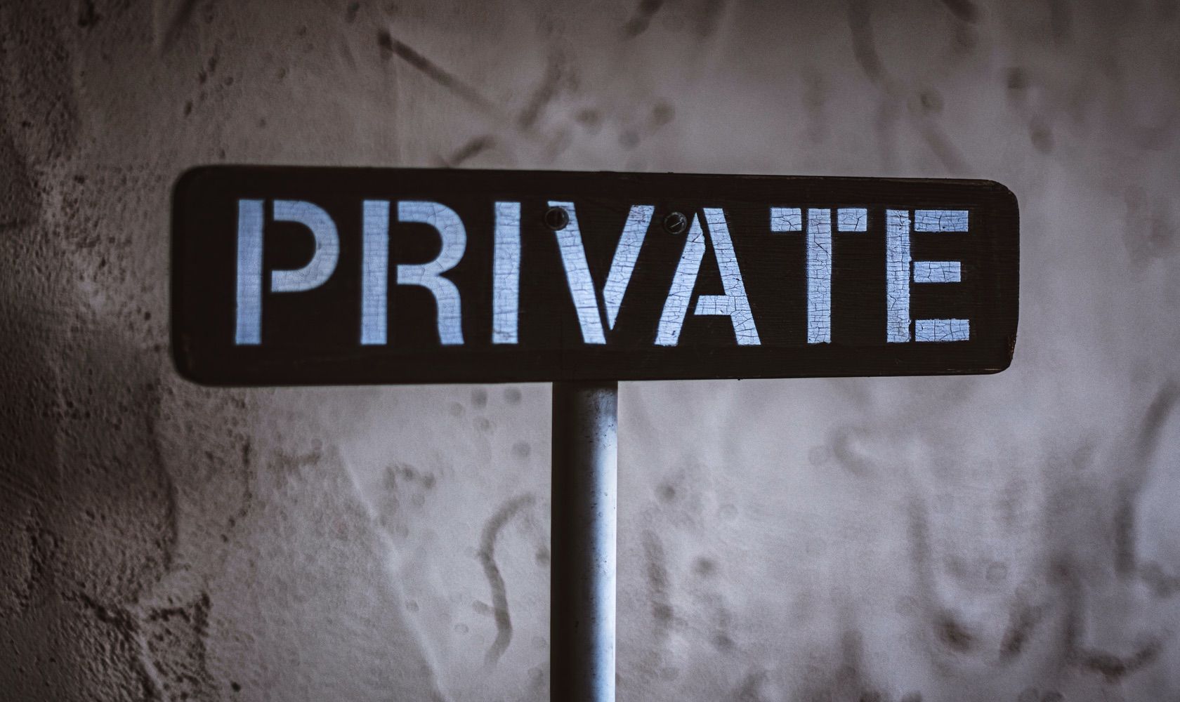 black and white sign that says private