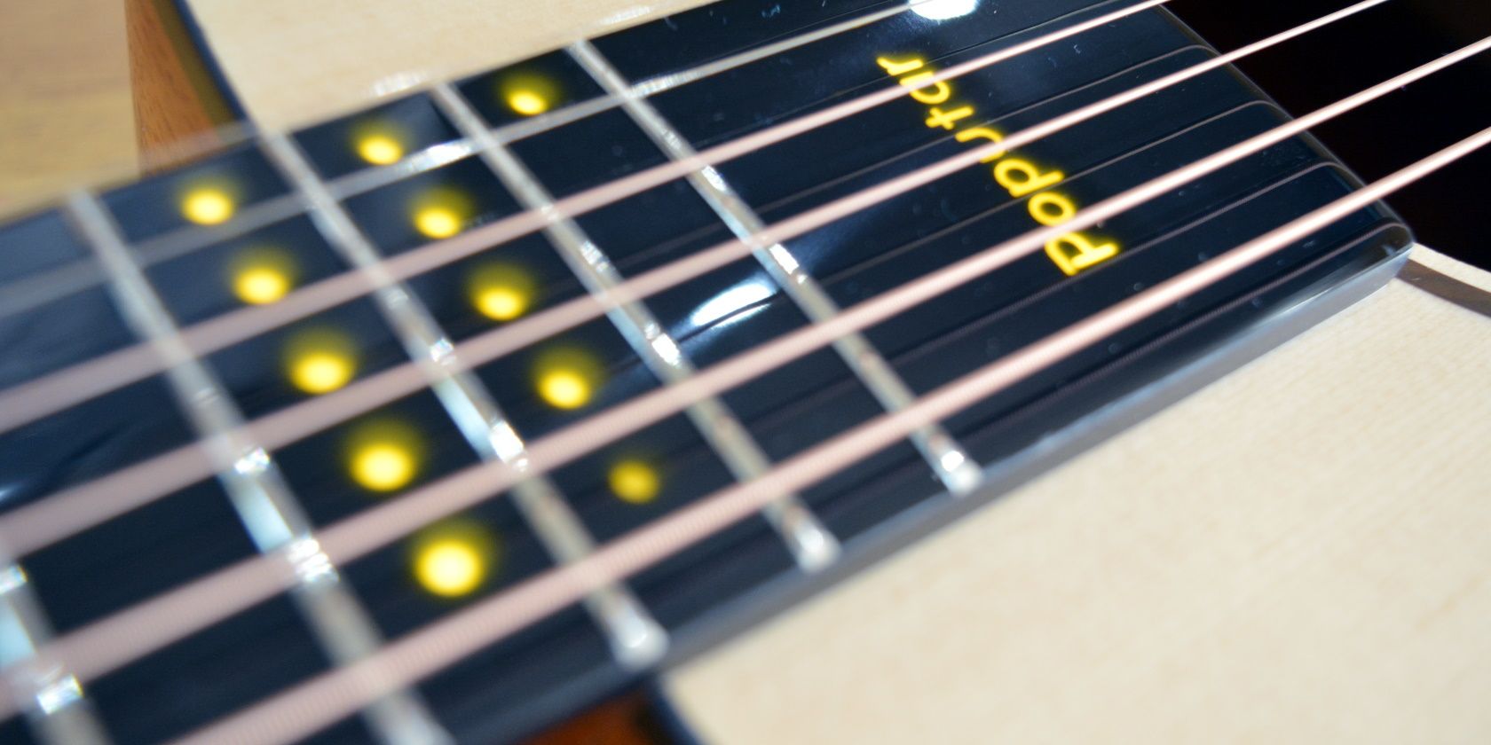 Poputar app-connected guitar features LEDs
