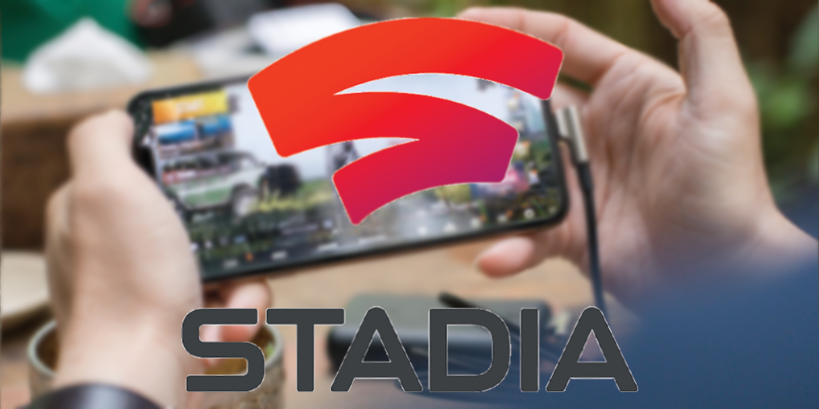 google stadia logo with iphone