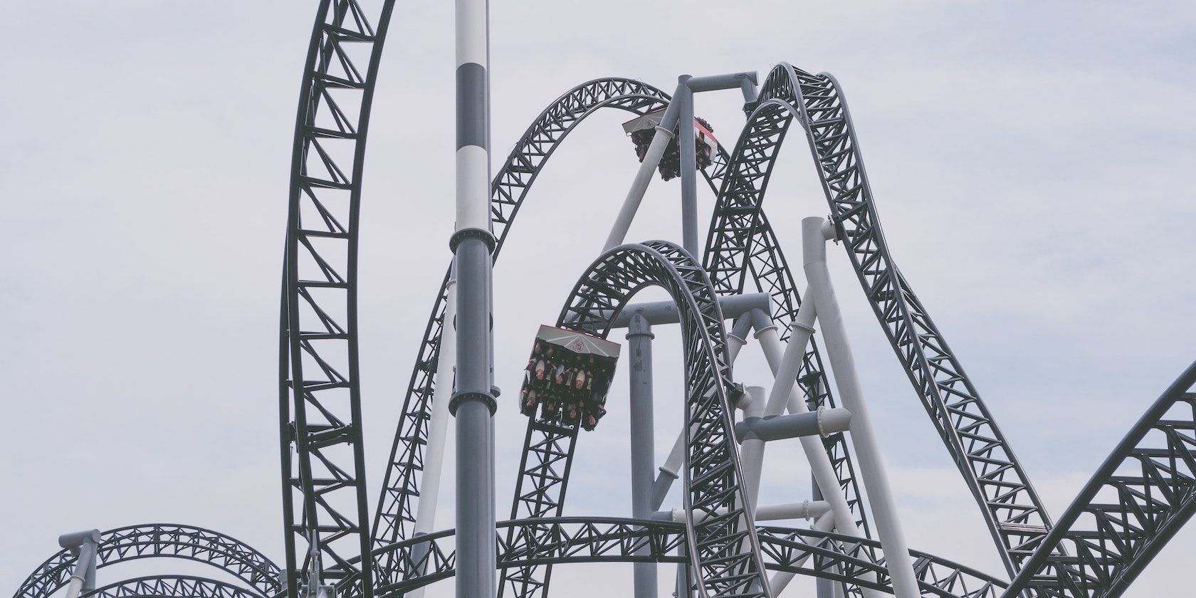 A photo of a roller coaster ride with looping tracks