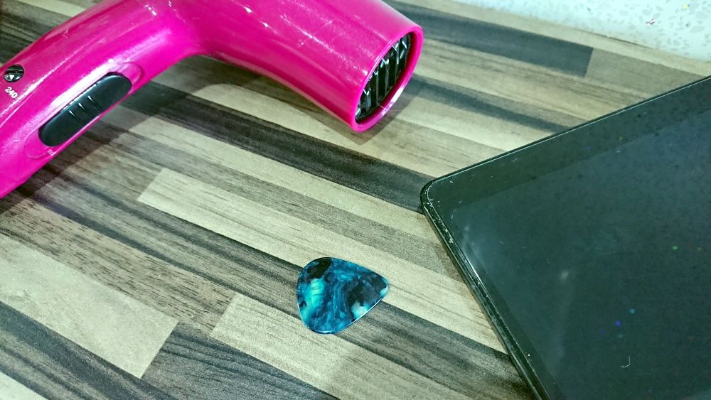 Use a hairdryer to soften the screen protector adhesive