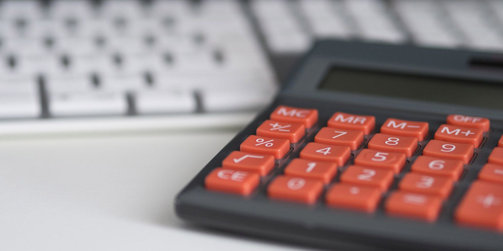 close up of calculator and keyboard