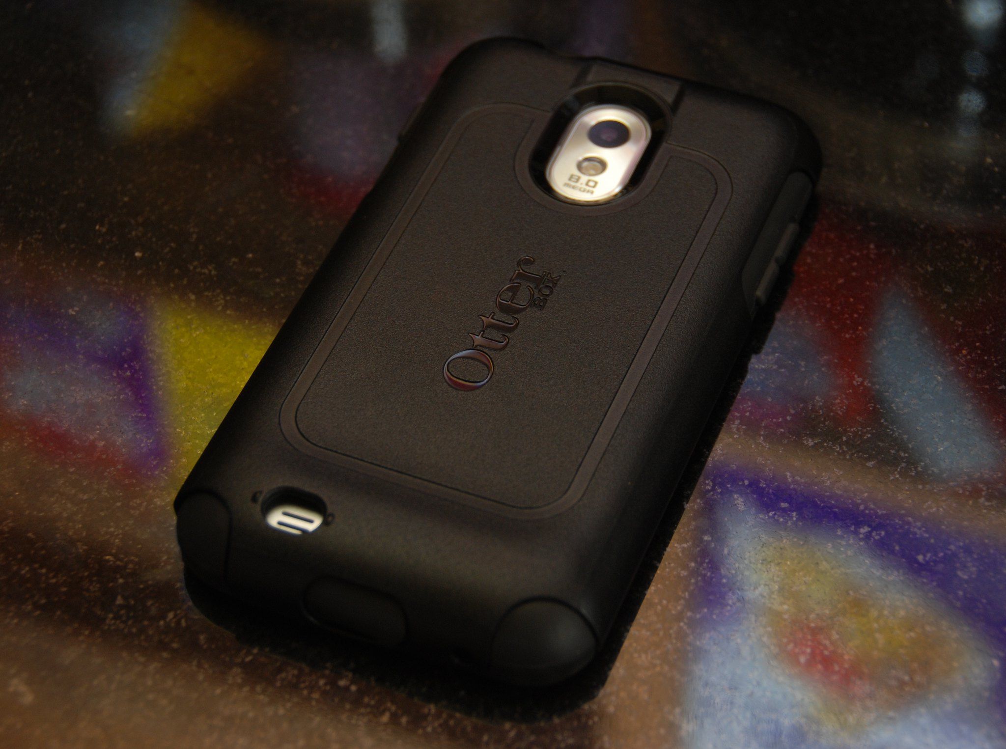 a black Otterbox case on a Samsung Galaxy phone