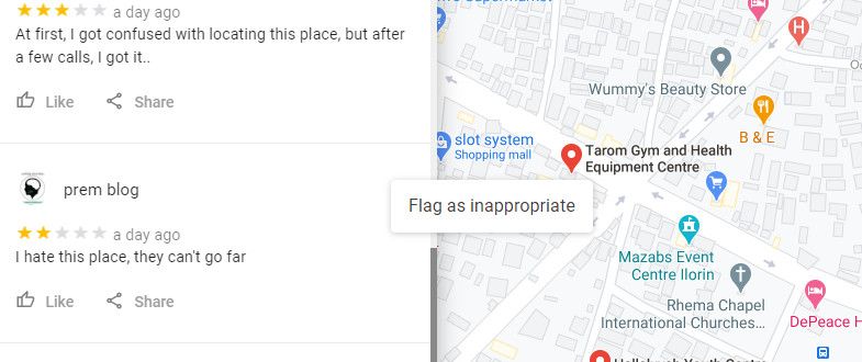 Click on the three dots next to bad review and select flag as inappropriate