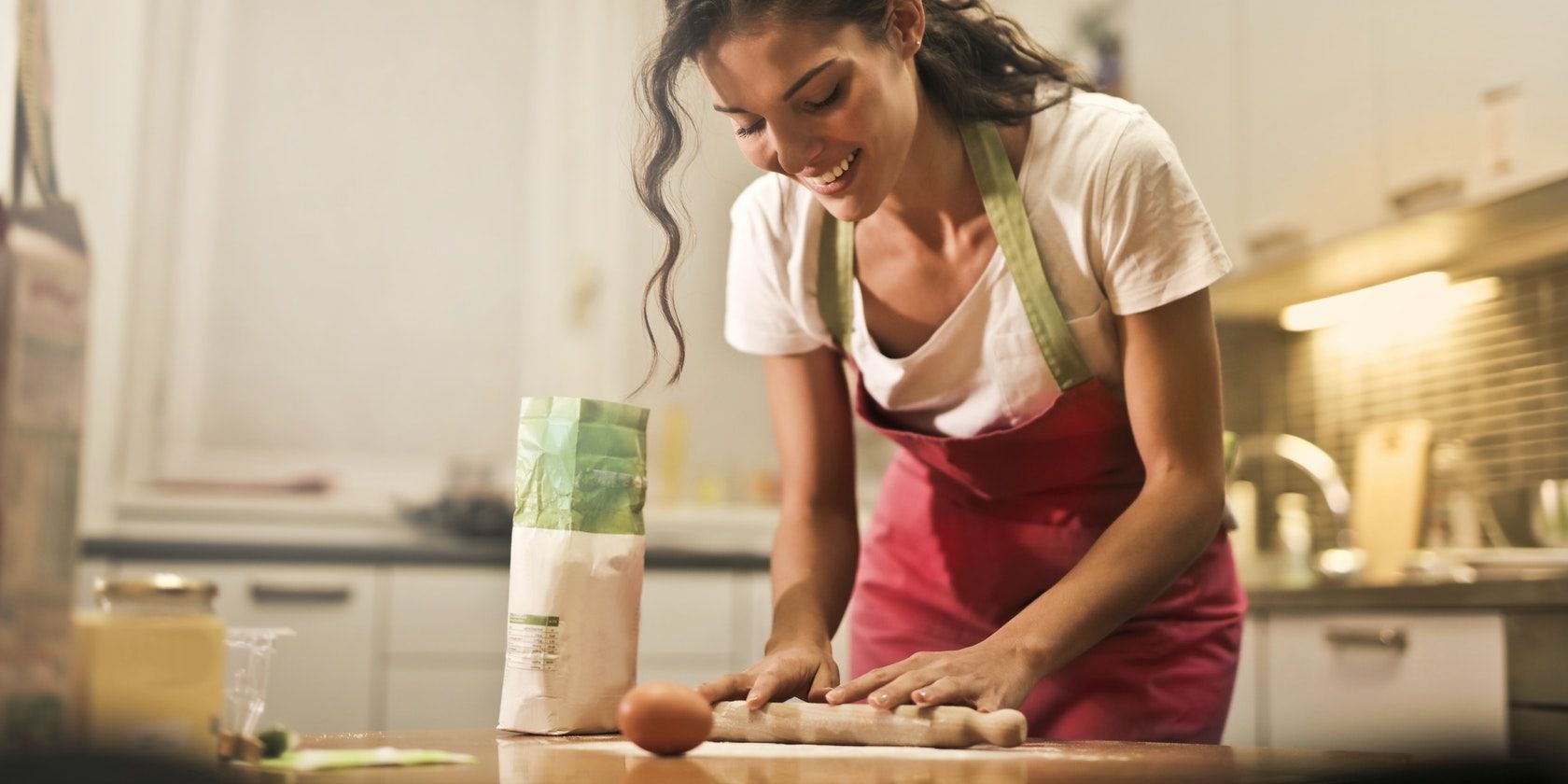 Woman Working Happily in the Kitchen