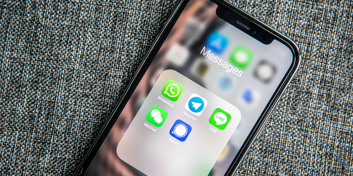 A folder of messaging apps on an iPhone