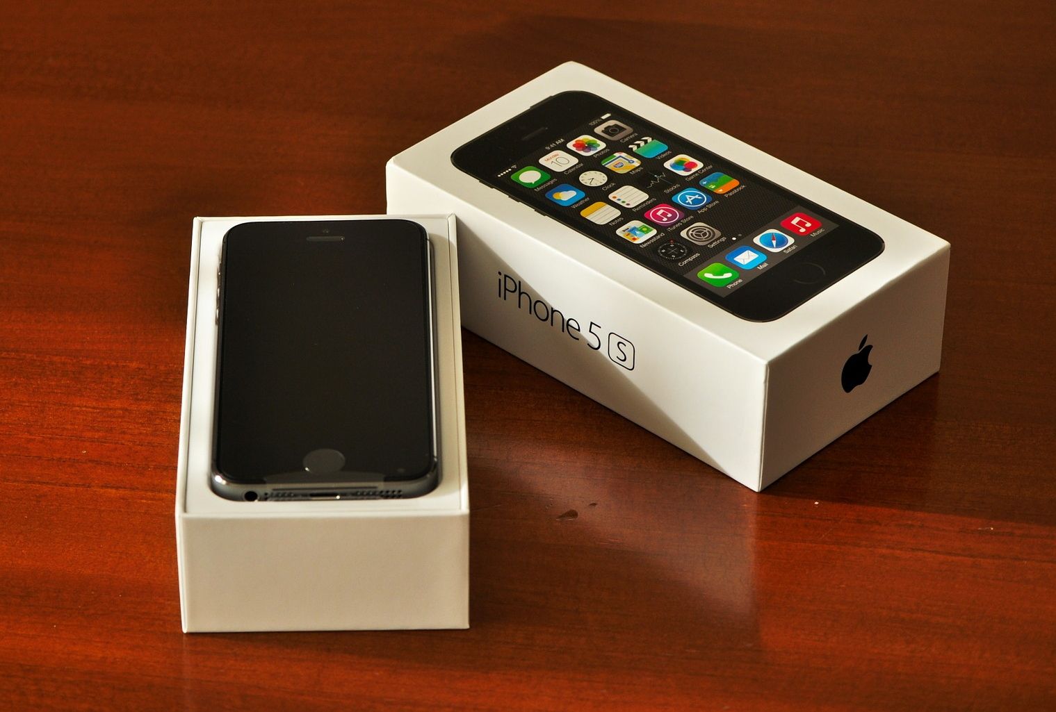 An iPhone 5s box. The model name is displayed on the side.