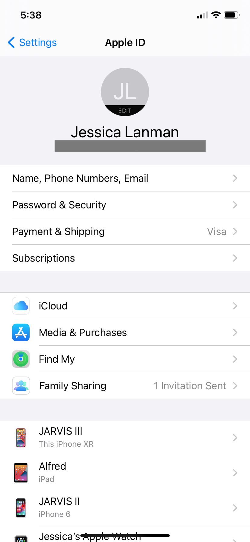 The Apple ID page in the Settings of an iPhone XR