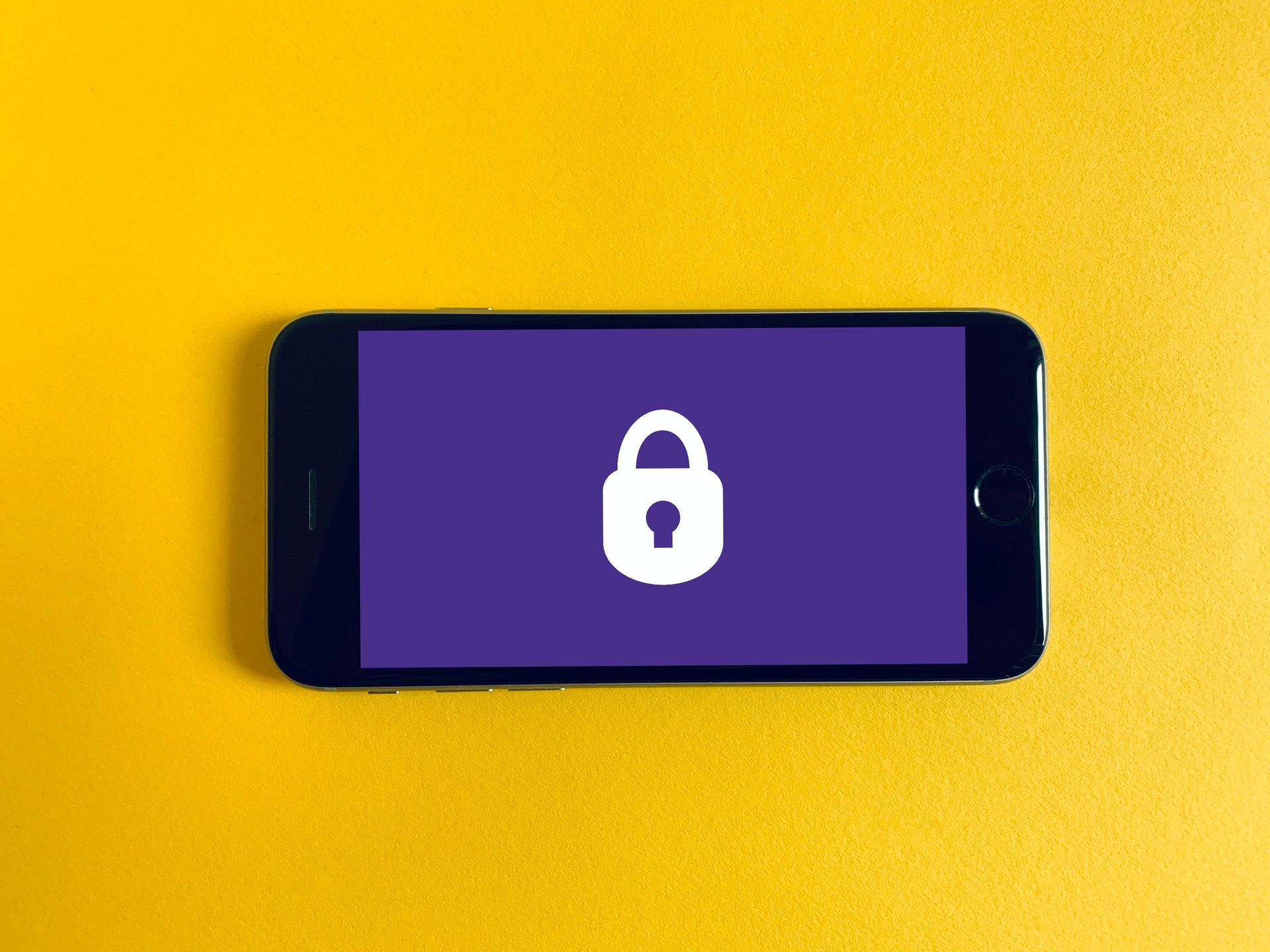 Phone with purple screen and white lock
