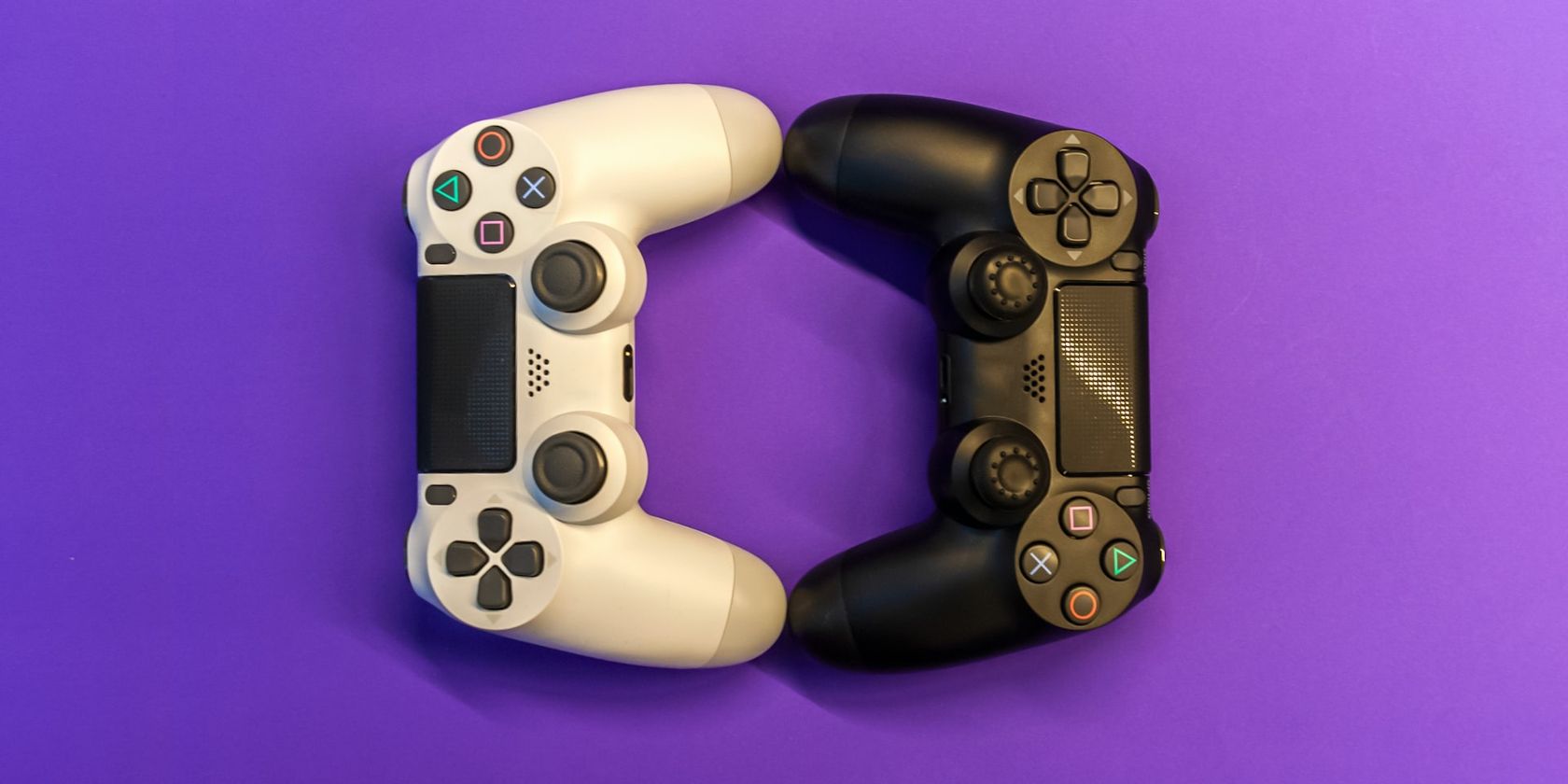 Two PlayStation Console Controllers